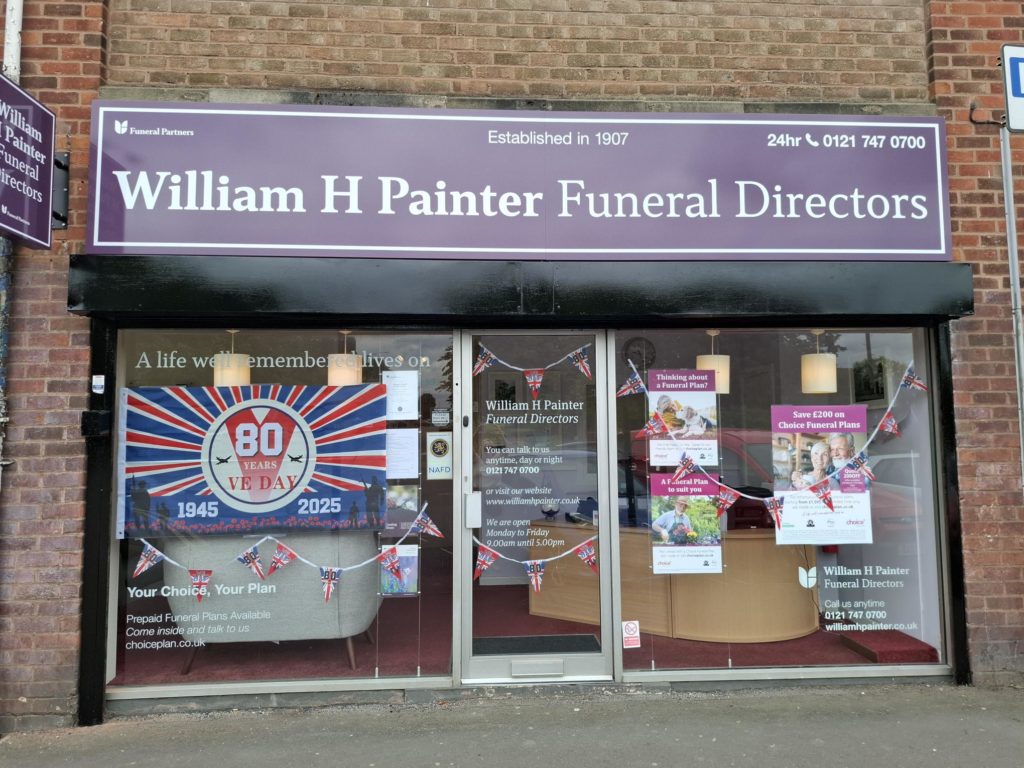 William H Painter VE Day window display